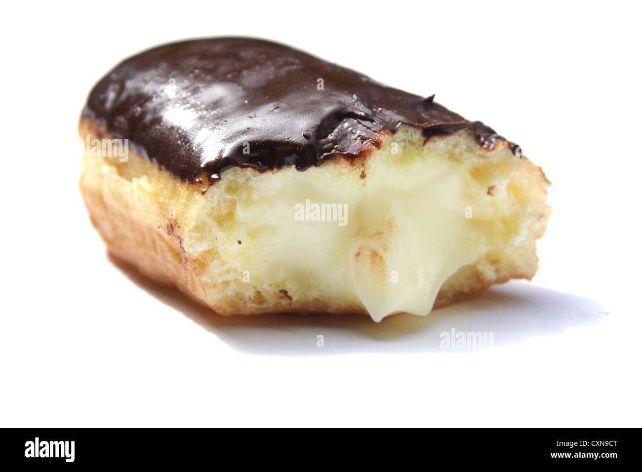 Chocolate cream filled donut on white background Stock Photo - Alamy