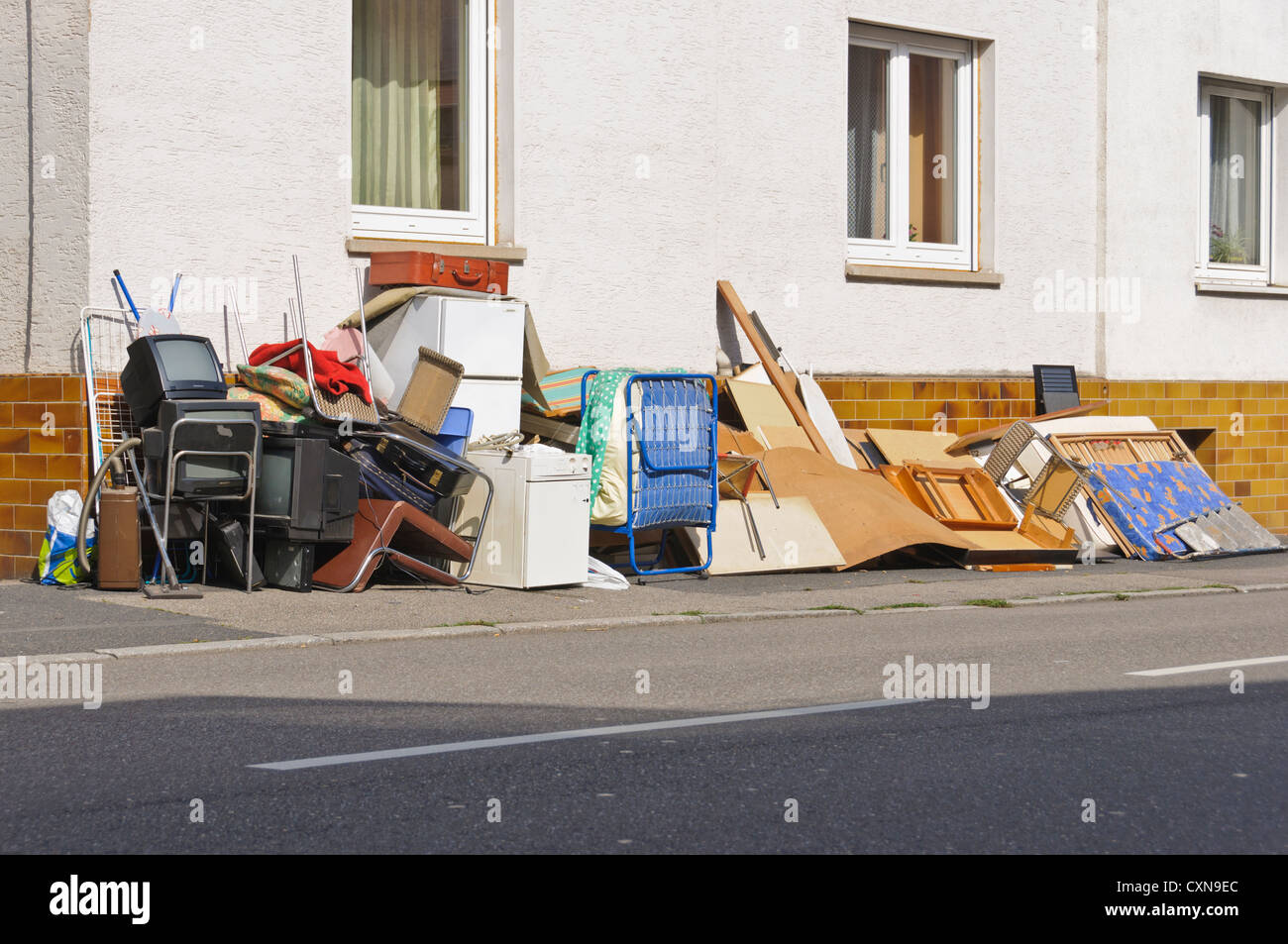 Broken TV sets, refrigerators, beds, chairs, garbage furniture, washing