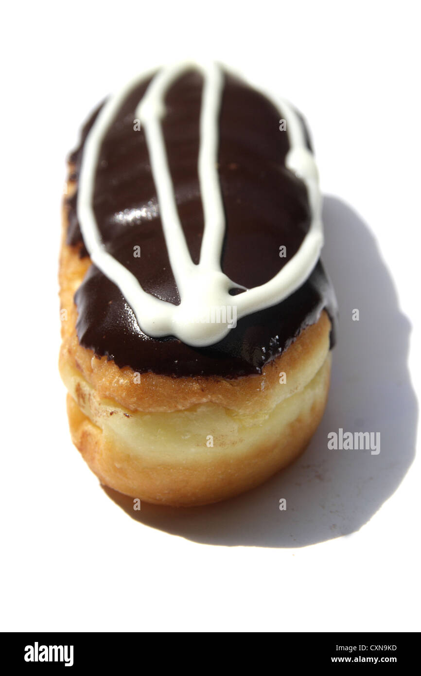 Chocolate cream filled donut on white background Stock Photo - Alamy
