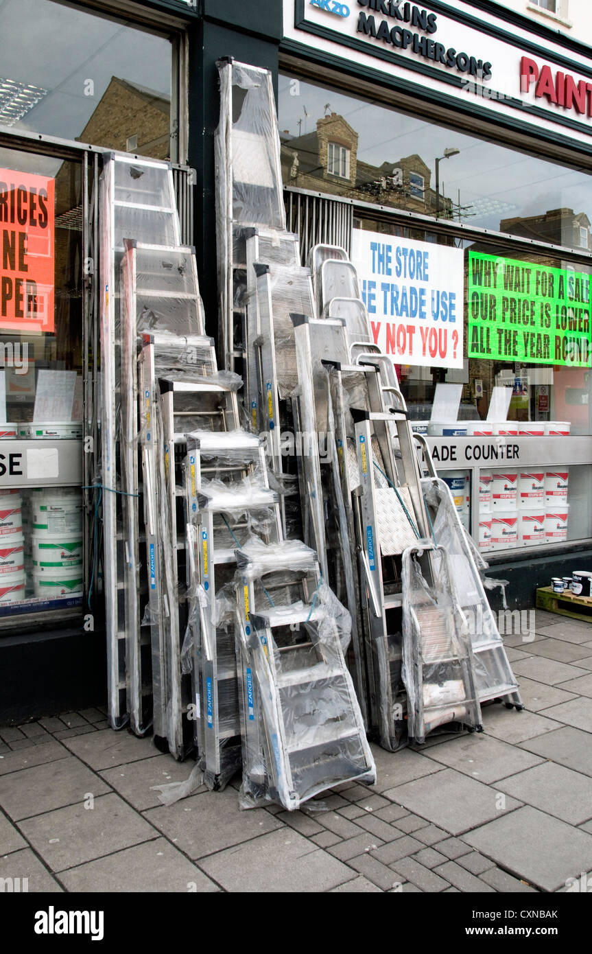 Aluminum ladders for sale outside DIY shop, Holloway Road, London