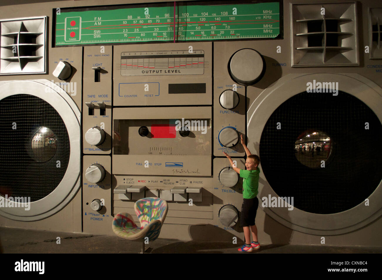 Giant stereo ghetto blaster at debut UK art exhibition of Thierry Guetta also known as Mr Brainwash at the Old Sorting Office in Stock Photo