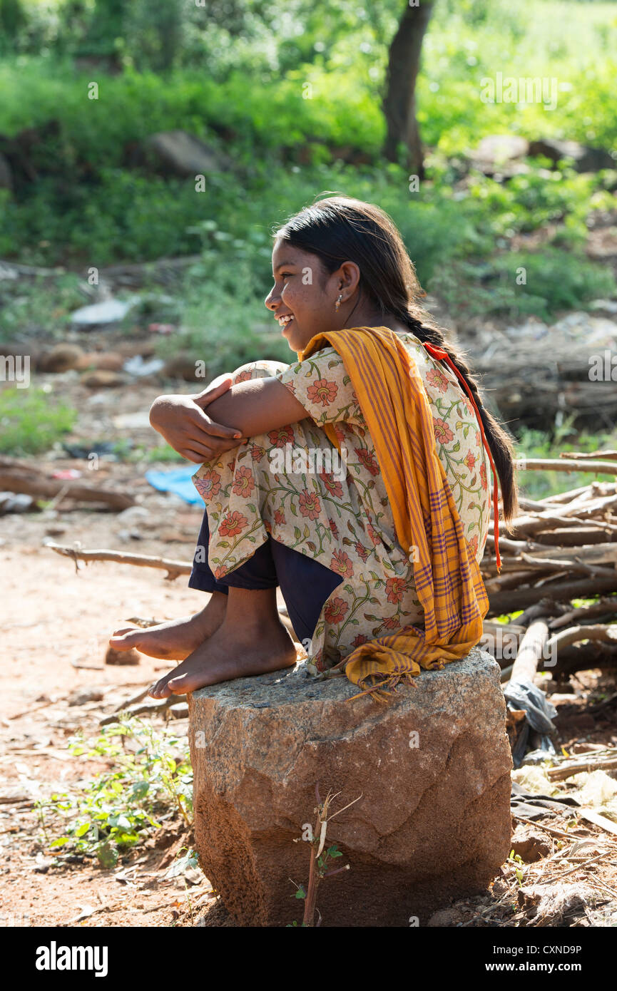 Indian village girl sitting on a rock. Andhra Pradesh, India Stock ...
