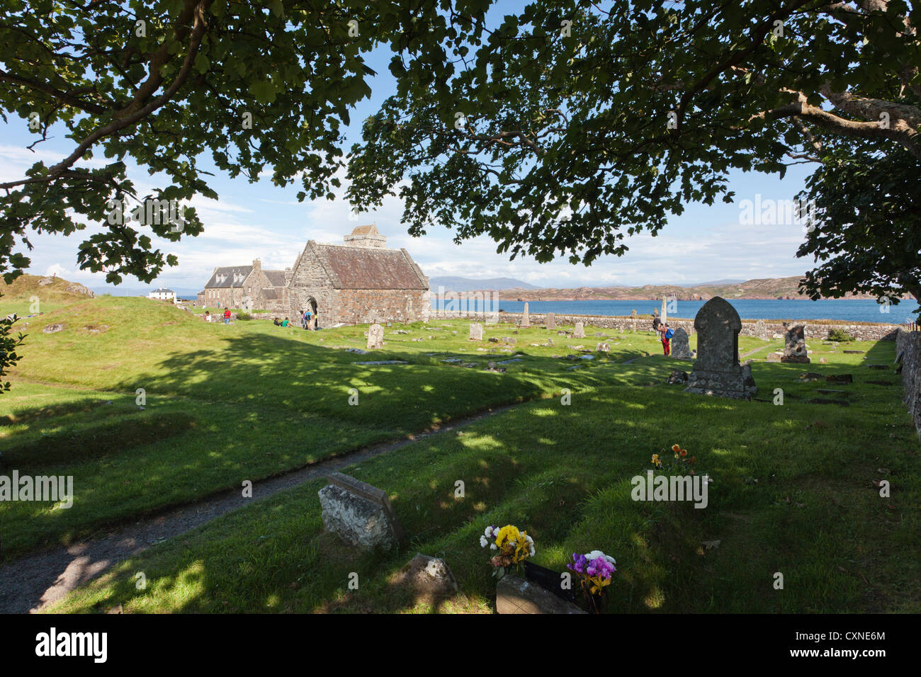 The sacred burial ground of Reilig Odhráin, alongside the 12th century St Orans Chapel next to Iona Abbey, Iona, Scotland, UK Stock Photo