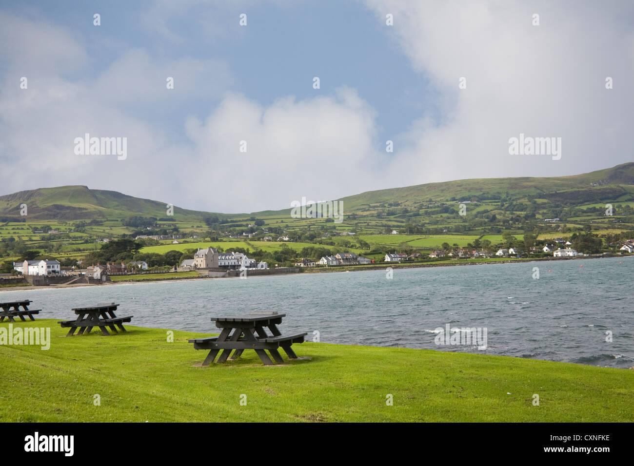 Ballygally Co Antrim Northern Ireland September Looking across bay to sea  side town from a picnic area to Bally Castle Scottish looking 17thc castle  Stock Photo - Alamy