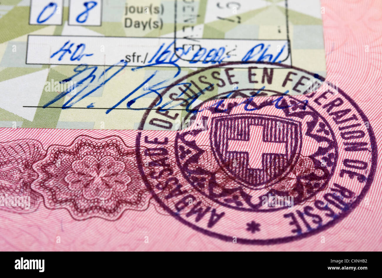 Visa stamp in swiss passport Stock Photo - Alamy