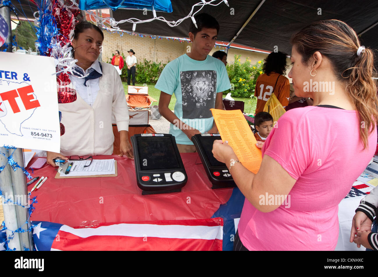 Voter registration booth at an outdoor church festival in Austin, Texas