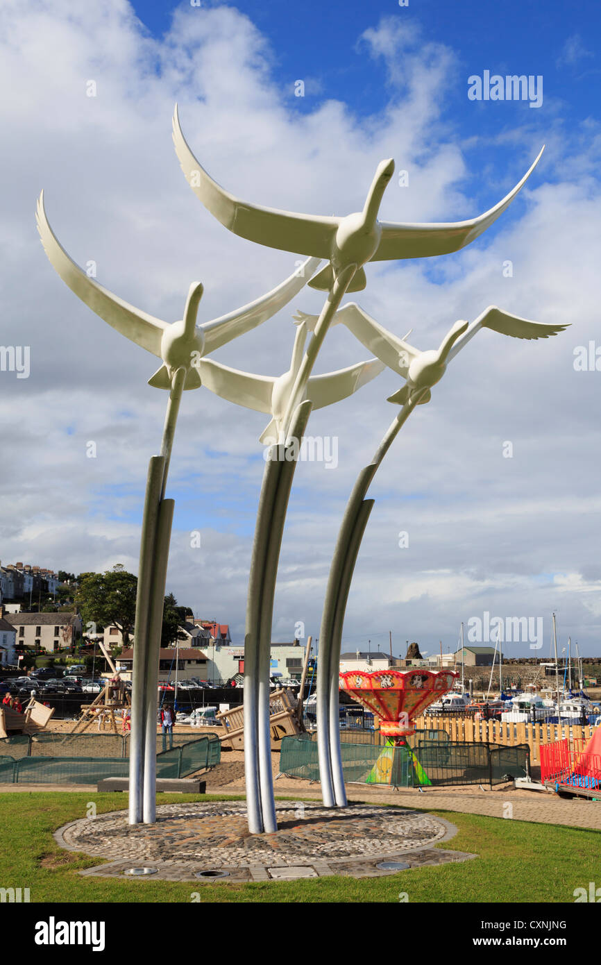 Four Swans sculpture from the Children of Lir legend on the seafront in Ballycastle, County Antrim, Northern Ireland, UK Stock Photo