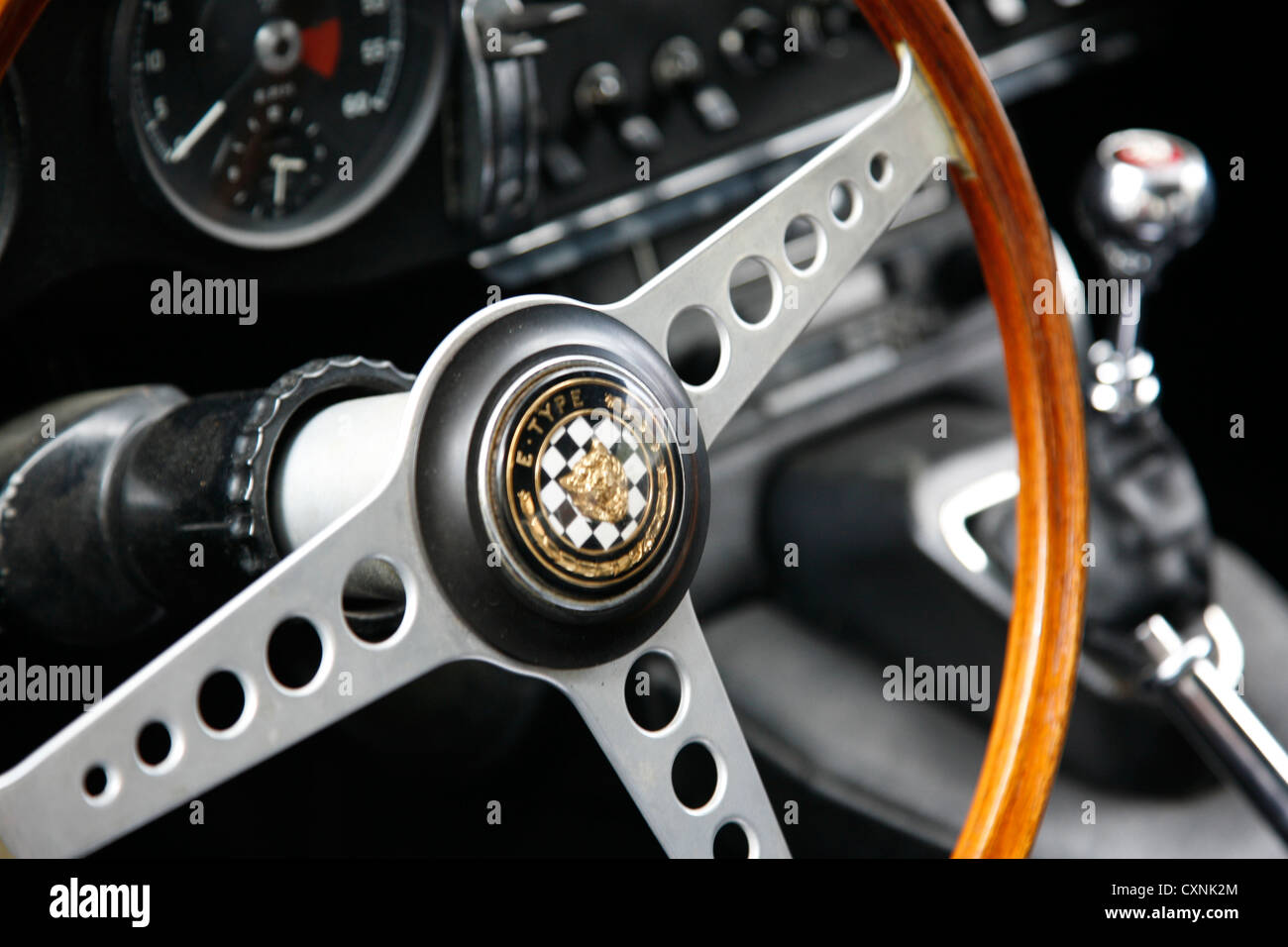 Jaguar E-Type interior shot of steering wheel and dashboard Stock Photo