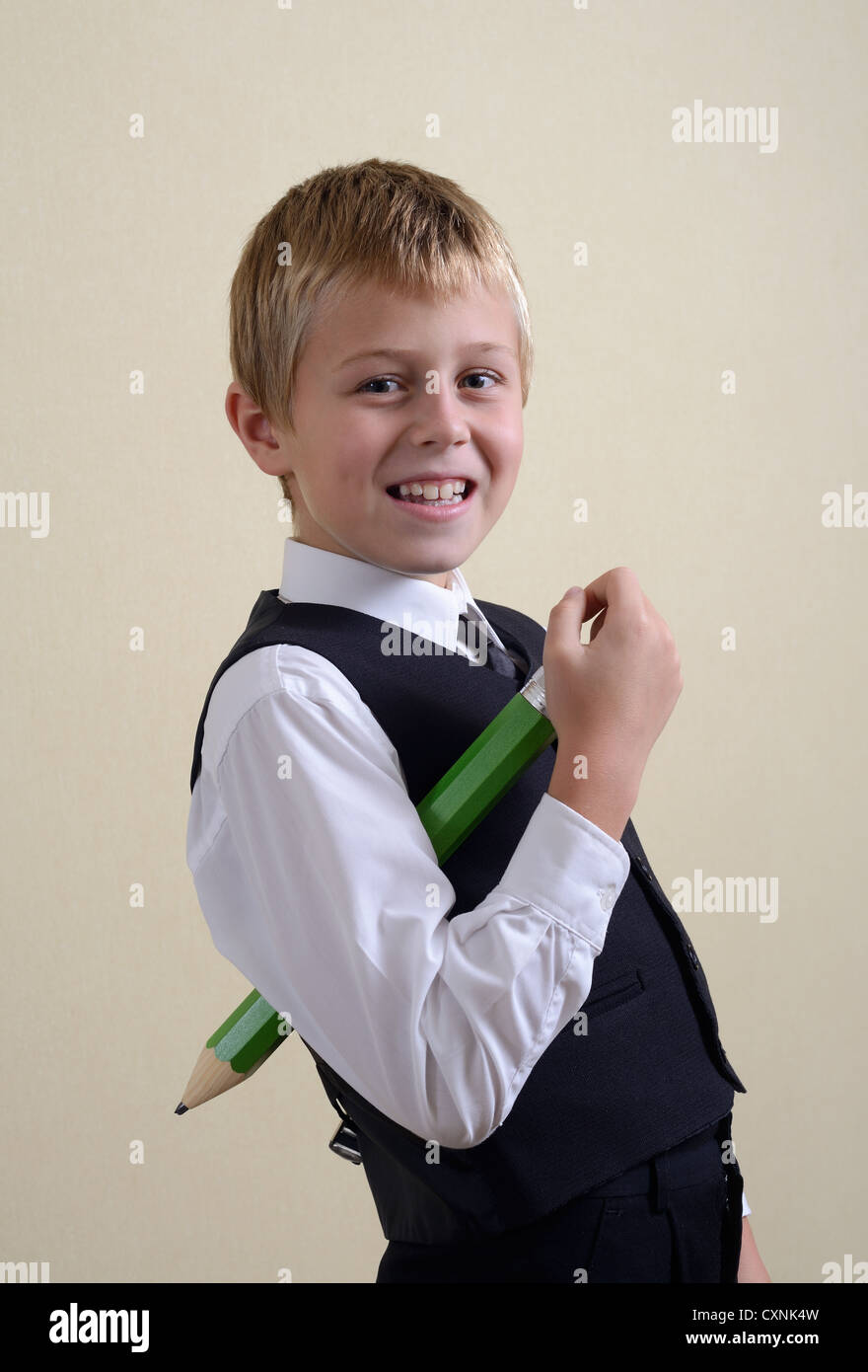 brave schoolboy with big pencil Stock Photo