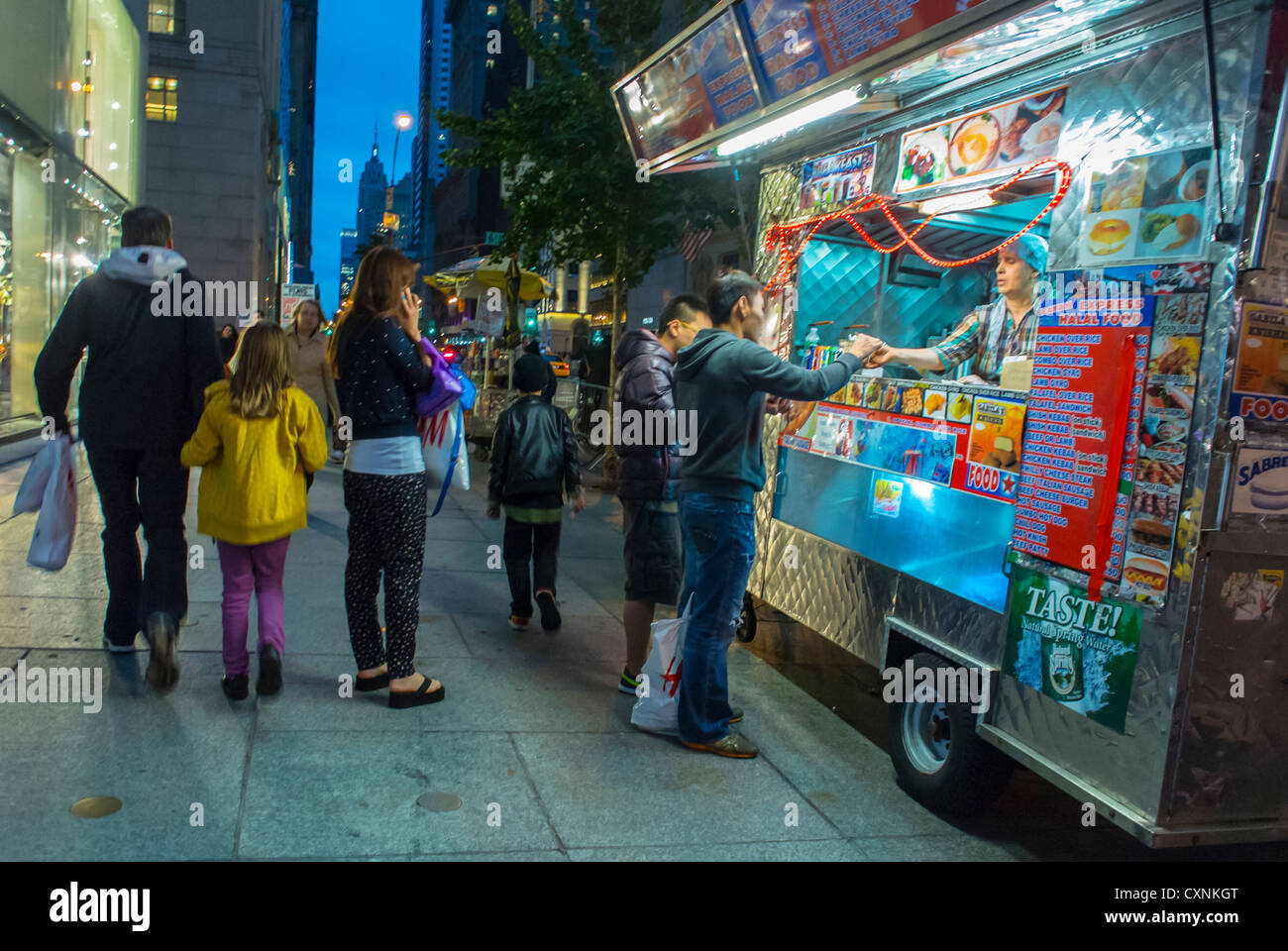 Consumers asians chinese men buying food truck people adults america hi