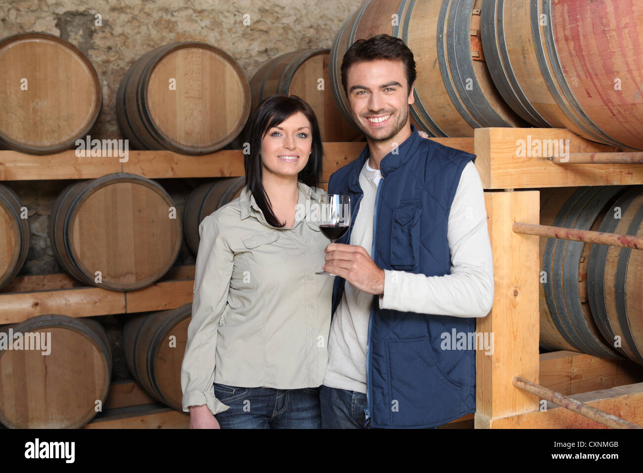 Couple tasting a wine in a winery Stock Photo - Alamy