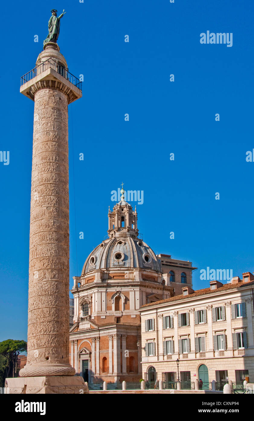 Trajan's Column in ruins of Trajan's Forum with Church of Santa Maria di Loreto Stock Photo