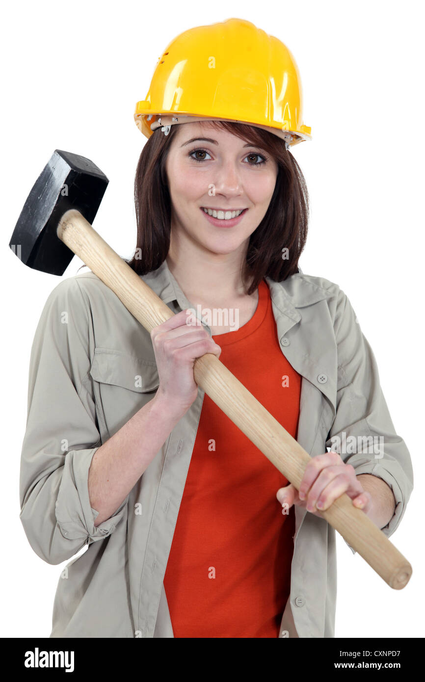 Female labouror holding sledge hammer Stock Photo Alamy