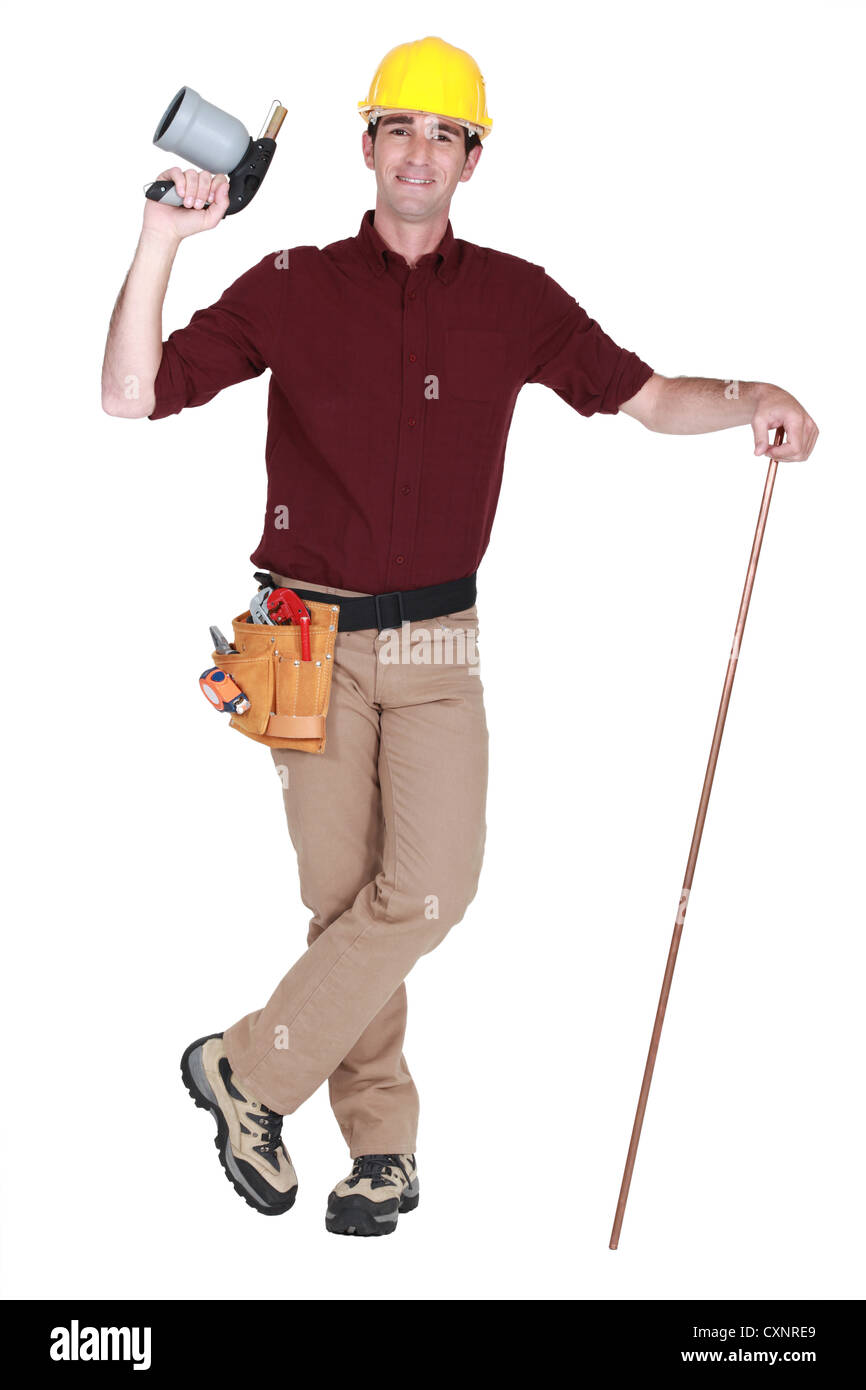 Blow torch and copper pipe being held by plumber Stock Photo Alamy
