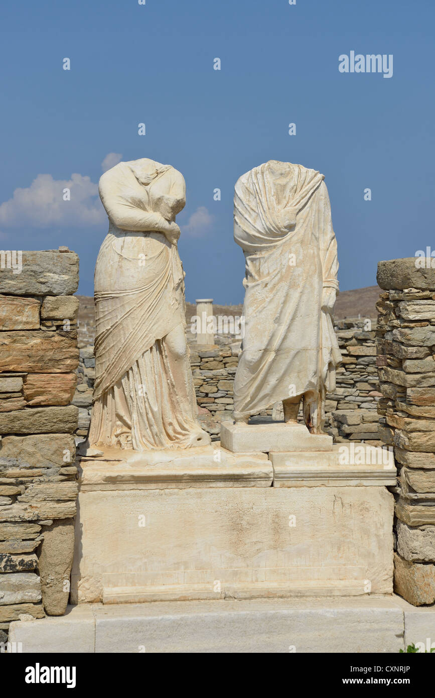 Cleopatra and Dioskourides statues at House of Cleopatra, Archaeological site of Delos, Delos, Cyclades, South Aegean, Greece Stock Photo