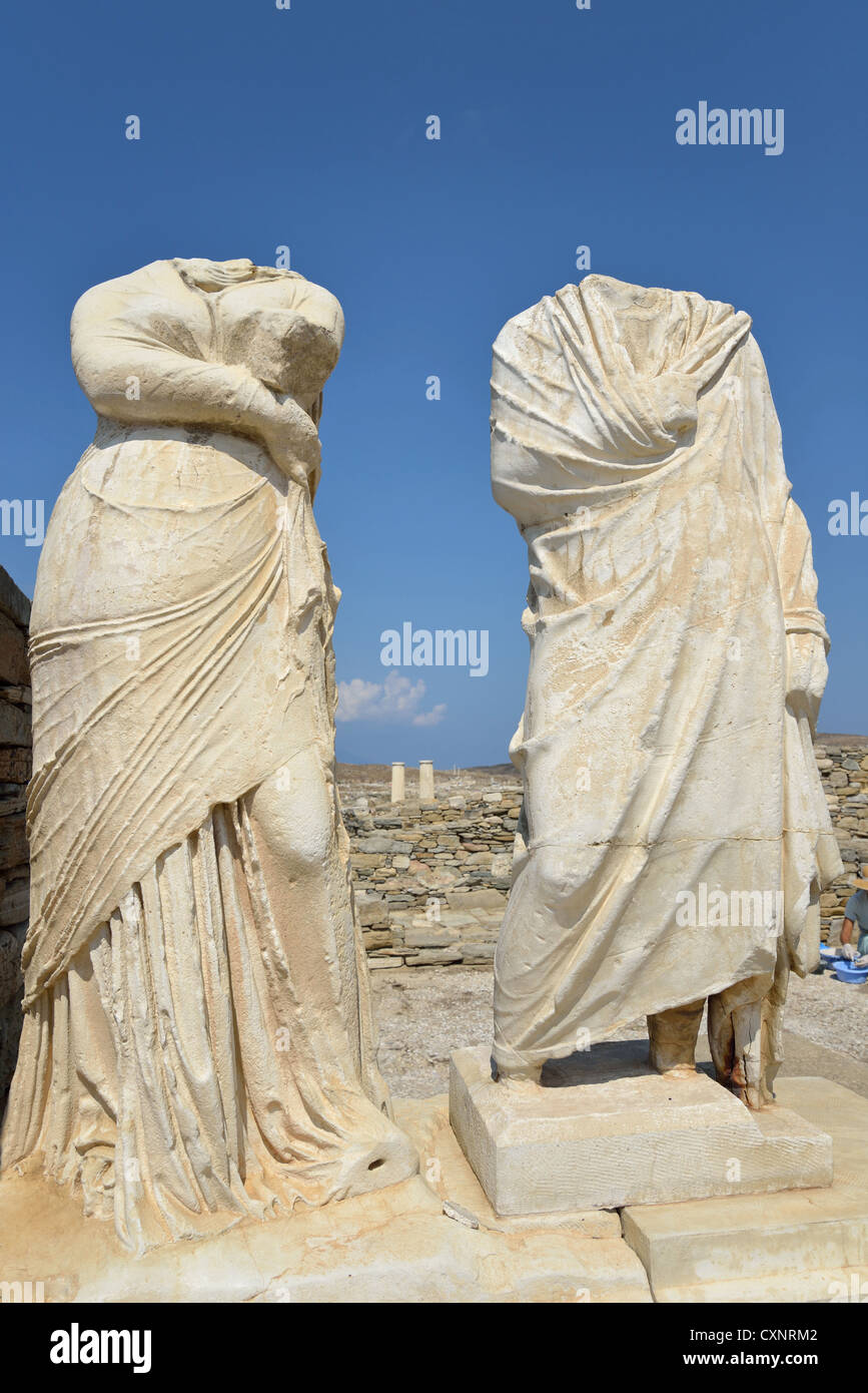 Cleopatra and Dioskourides statues at House of Cleopatra, Archaeological site of Delos, Delos, Cyclades, South Aegean, Greece Stock Photo