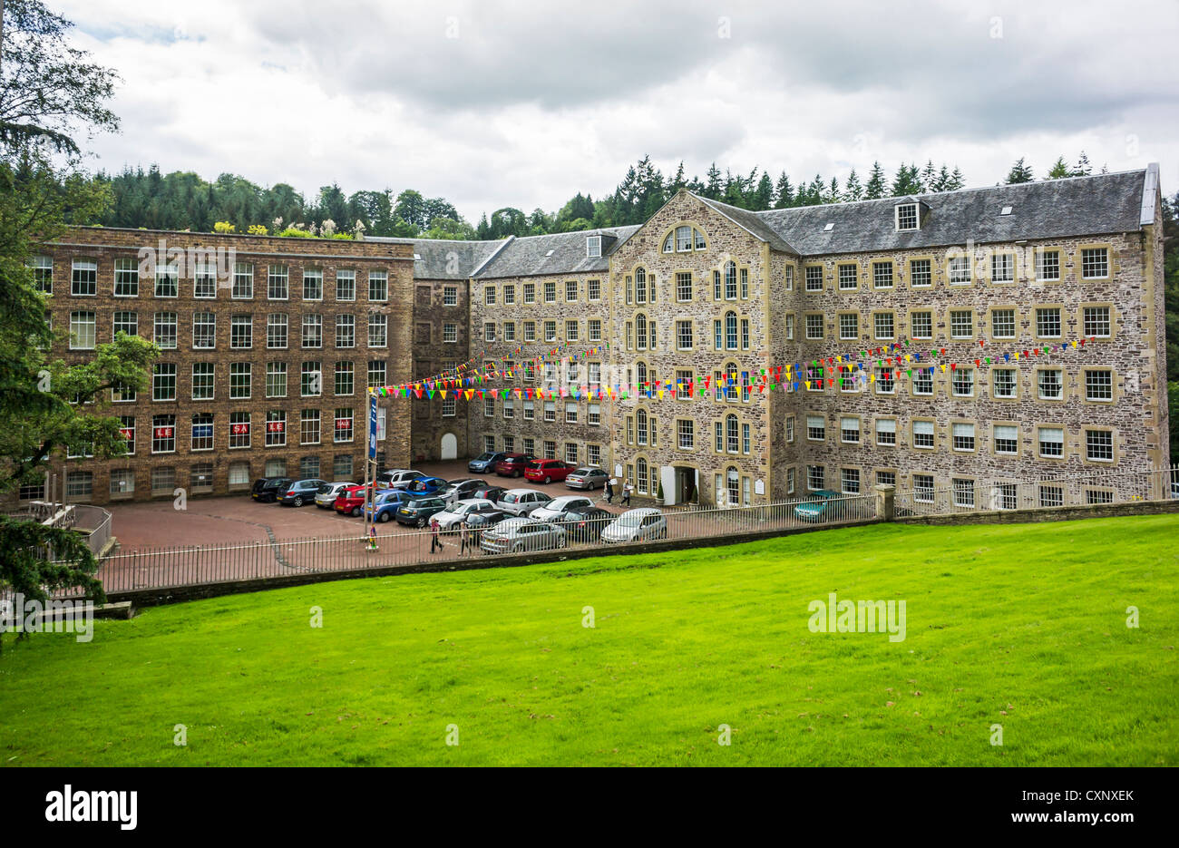 View of New Lanark Heritage Site with New Lanark Mill Hotel (right) Lanarkshire Scotland Stock Photo
