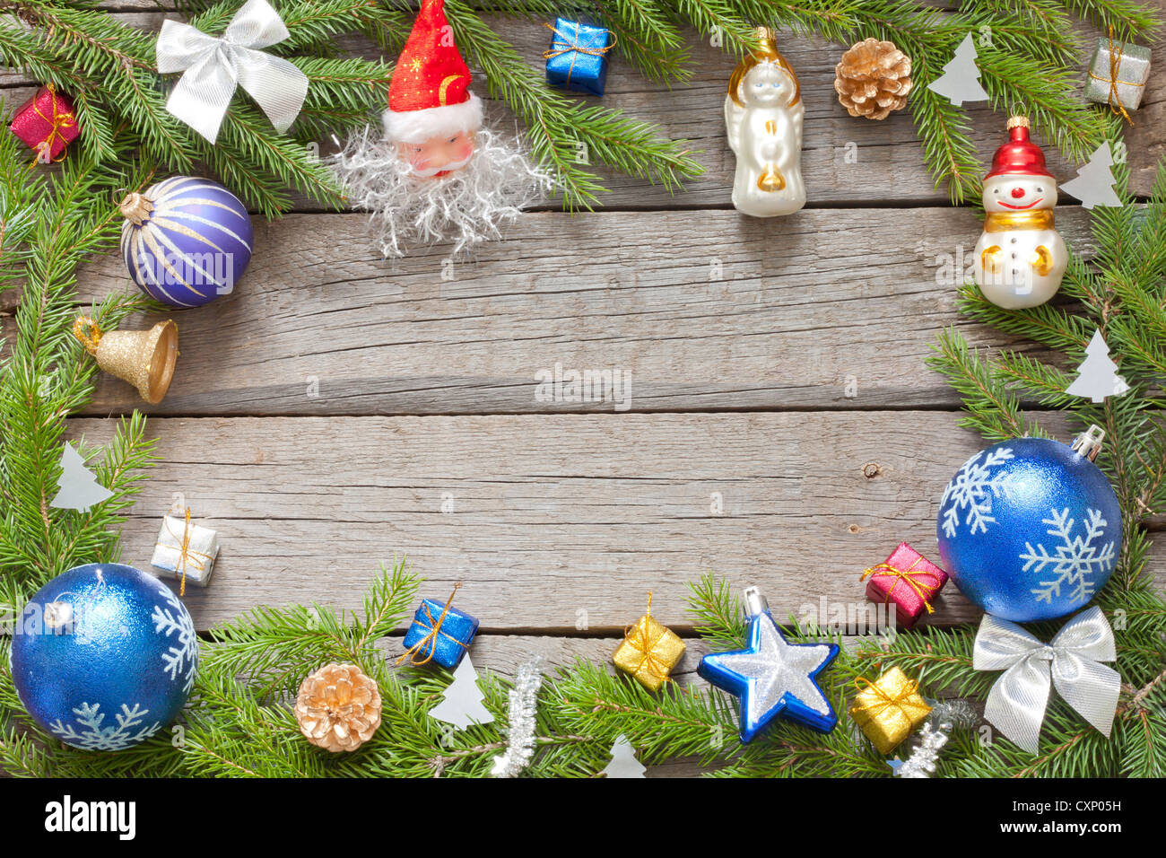 Christmas background border with baubles on wooden boards Stock Photo