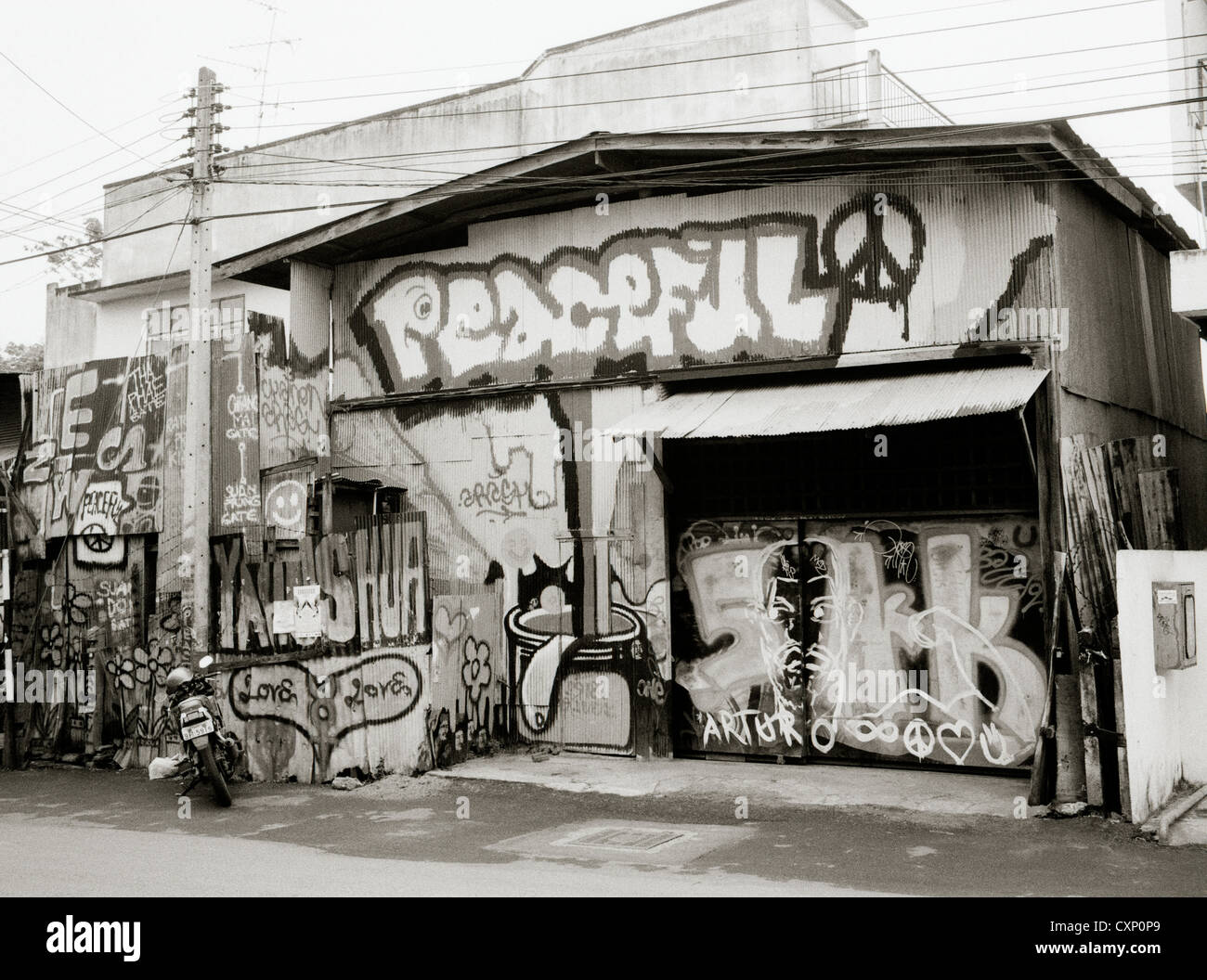 Graffiti street art in Chiang Mai in Thailand in Far East Southeast Asia. Culture Cultural House Life Lifestyle Modern Youth Reportage Travel Stock Photo