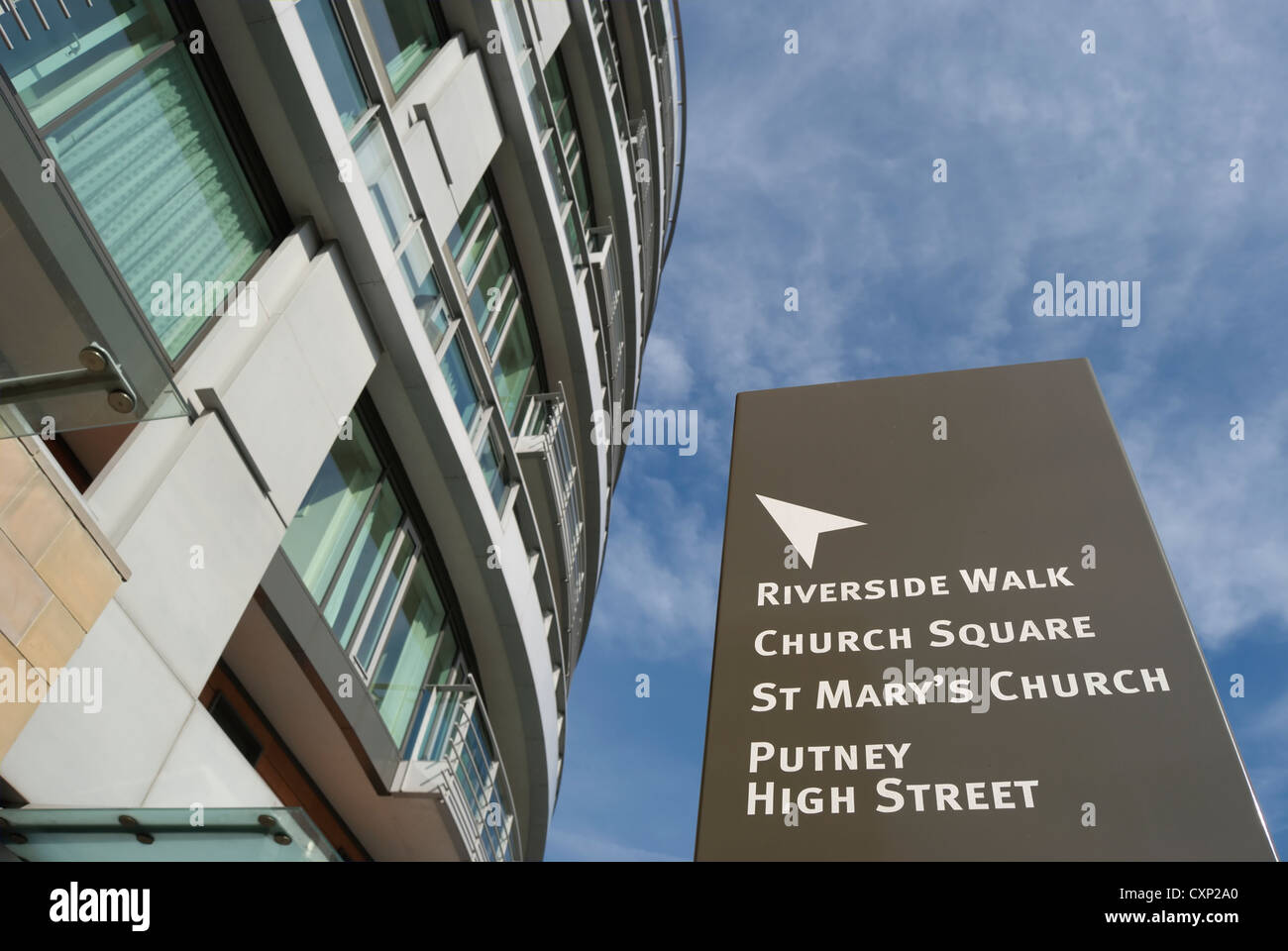 pillar sign giving local directions adjacent to putney wharf tower