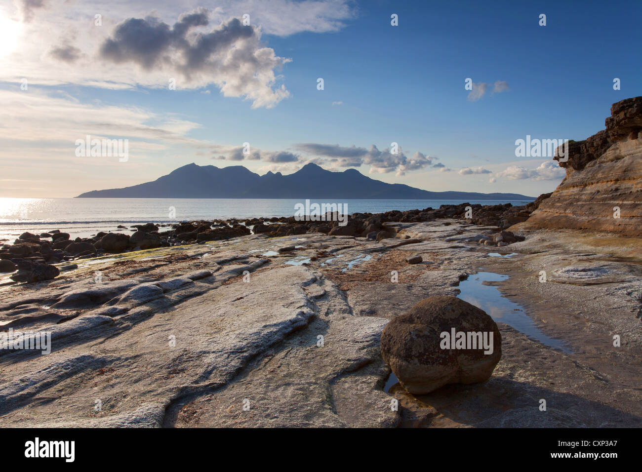 Isle of Eigg looking across the sea to Rum, Scotland Stock Photo