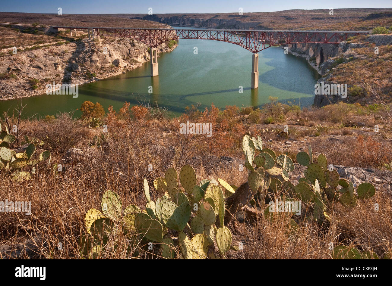 Highway bridge over Pecos River Canyon near its mouth to Rio Grande and Lake Amistad, Chihuahuan Desert near Comstock, Texas USA Stock Photo