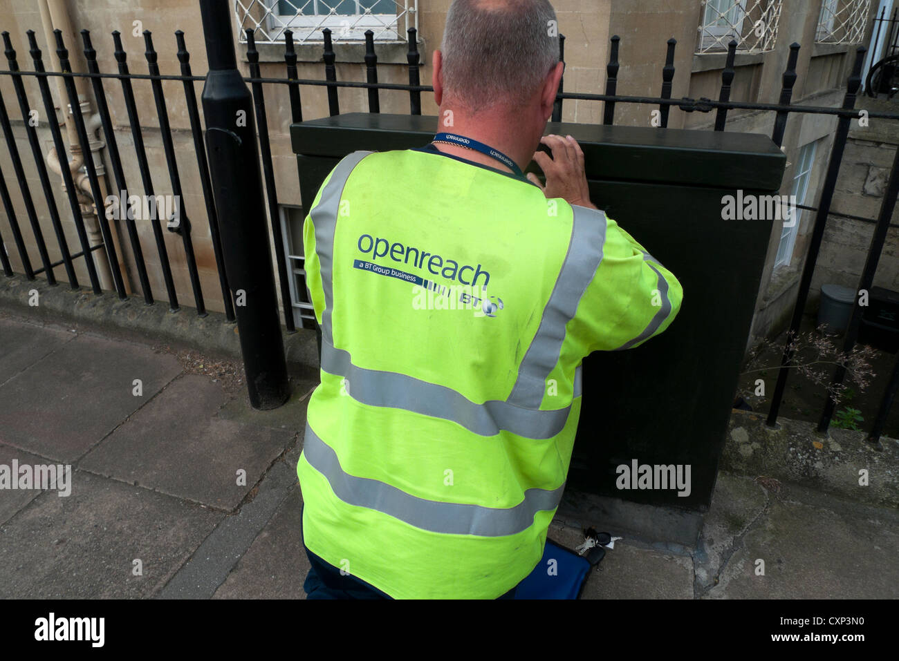 A BT British Telecom worker servicing a network box City of Bath, England, UK Stock Photo