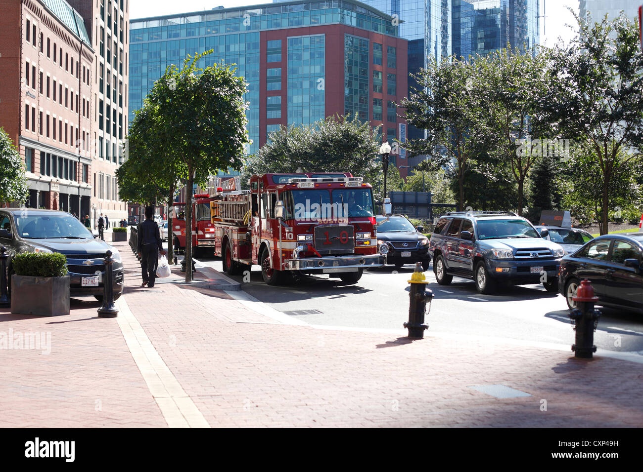 Boston Fire Trucks  Parked On Atlantic Avenue At Rowes Wharf Boston Massachusetts Stock Photo