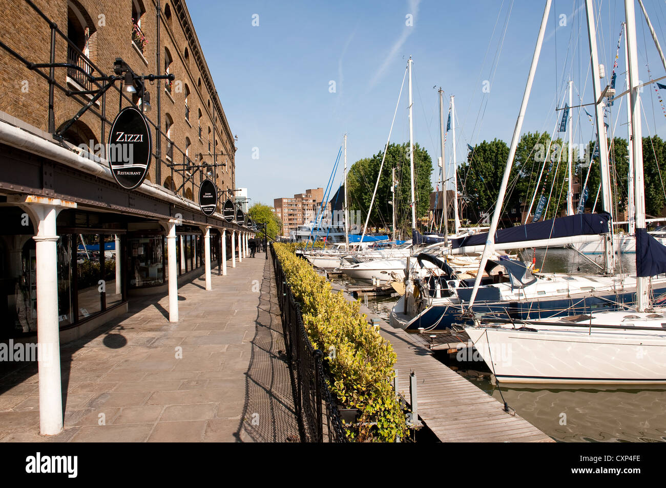 Yachts moored in the marina at St Katharine Docks, City of London, England. Stock Photo