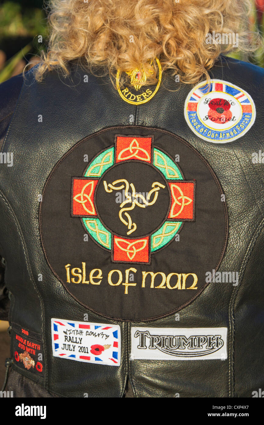 Lady biker showing Isle of man back patch Stock Photo