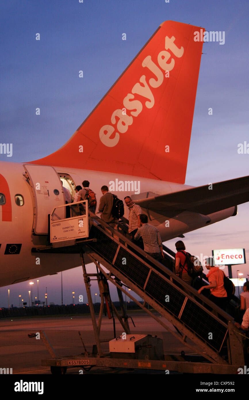 Passengers boarding on EasyJet Airbus A319. [Editorial use only] Stock