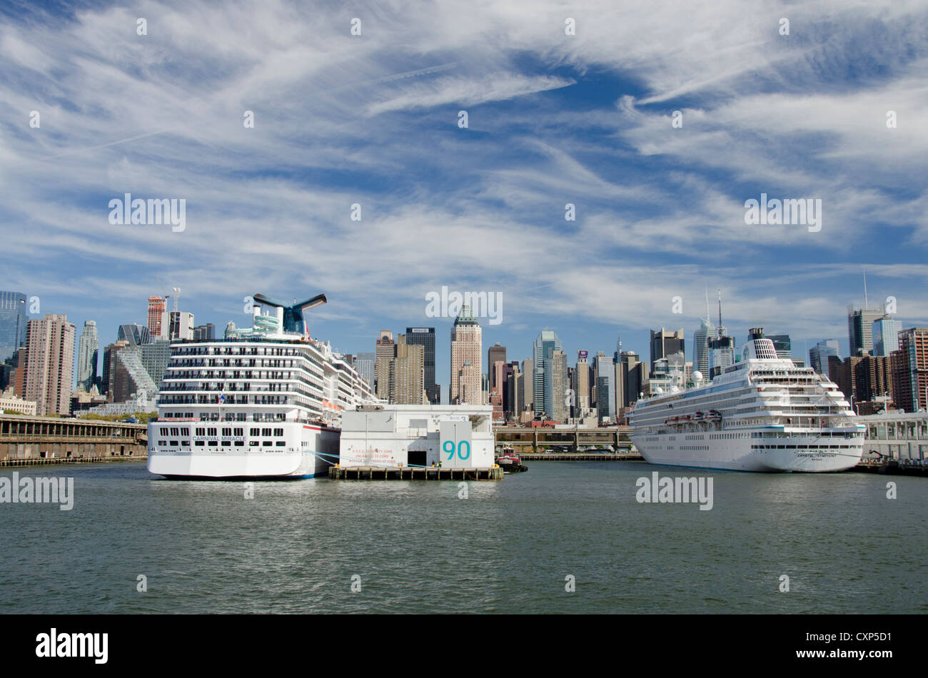 New York, New York. Downtown city skyline at Manhattan Terminal cruise ship pier. Cruise ship in