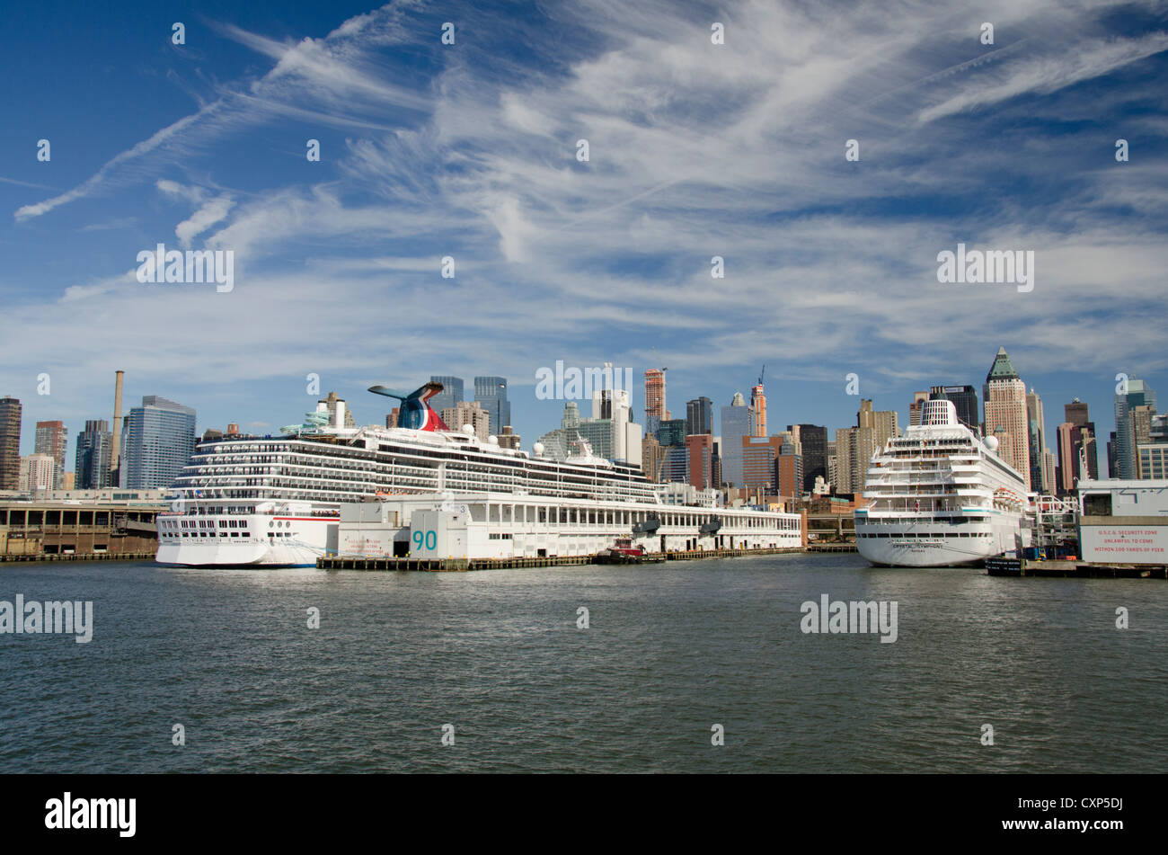 New York, New York. Downtown city skyline at Manhattan Terminal cruise ship pier. Cruise ships
