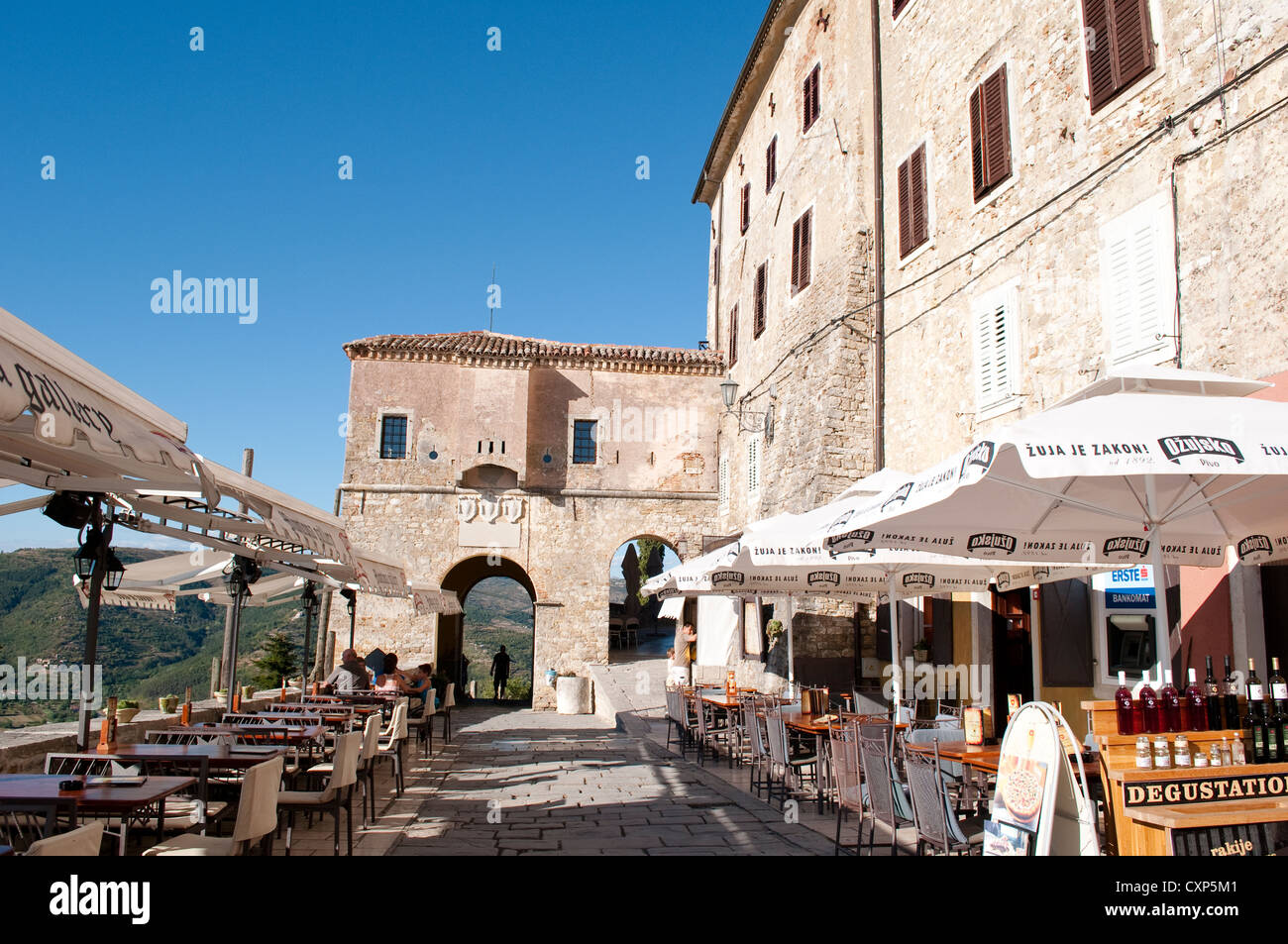 Restaurants within the city gates in Josef Ressel square, Motovun, Central Istria, Croatia Stock Photo