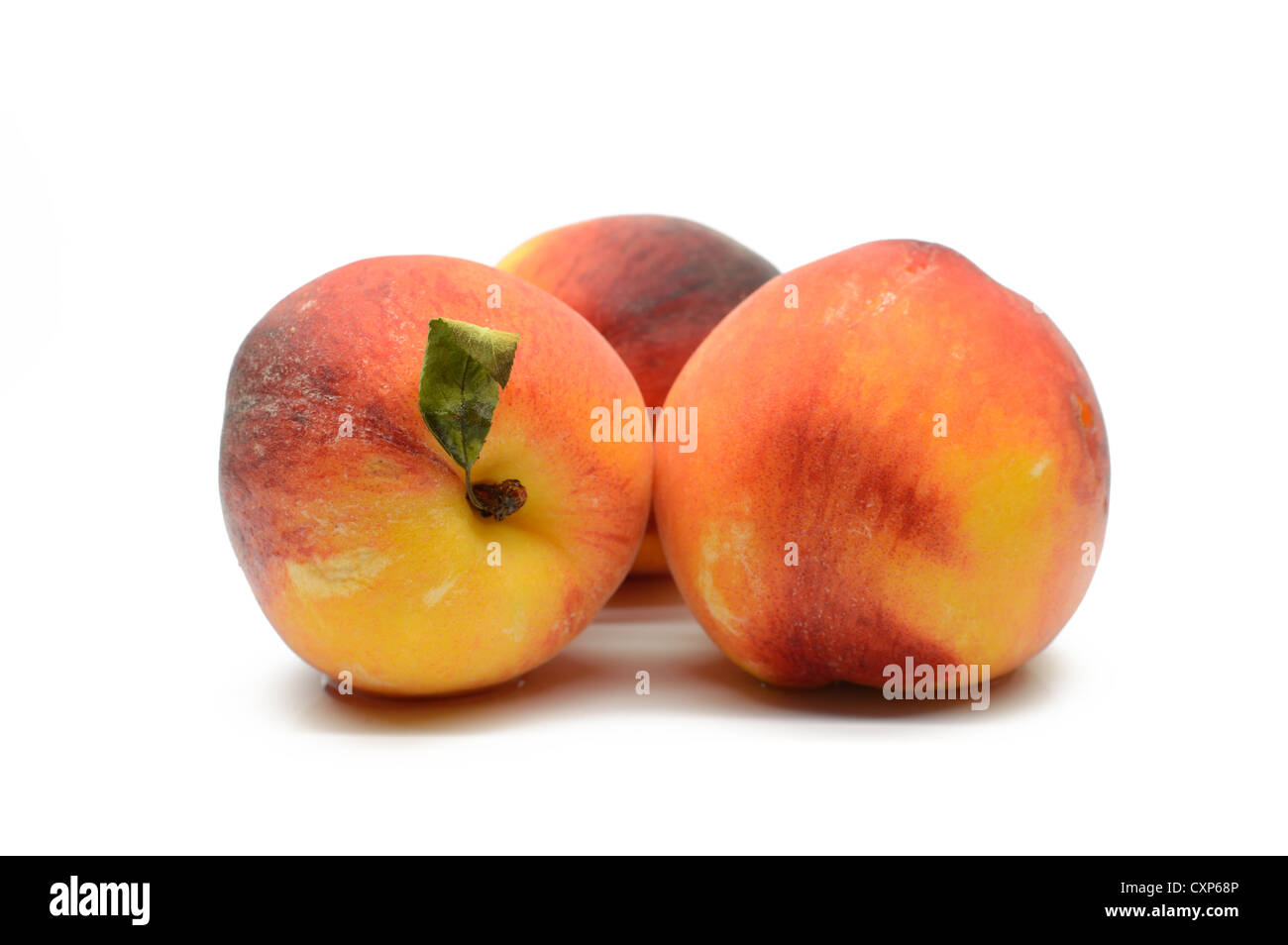 Juicy peaches on a white background, close-up Stock Photo