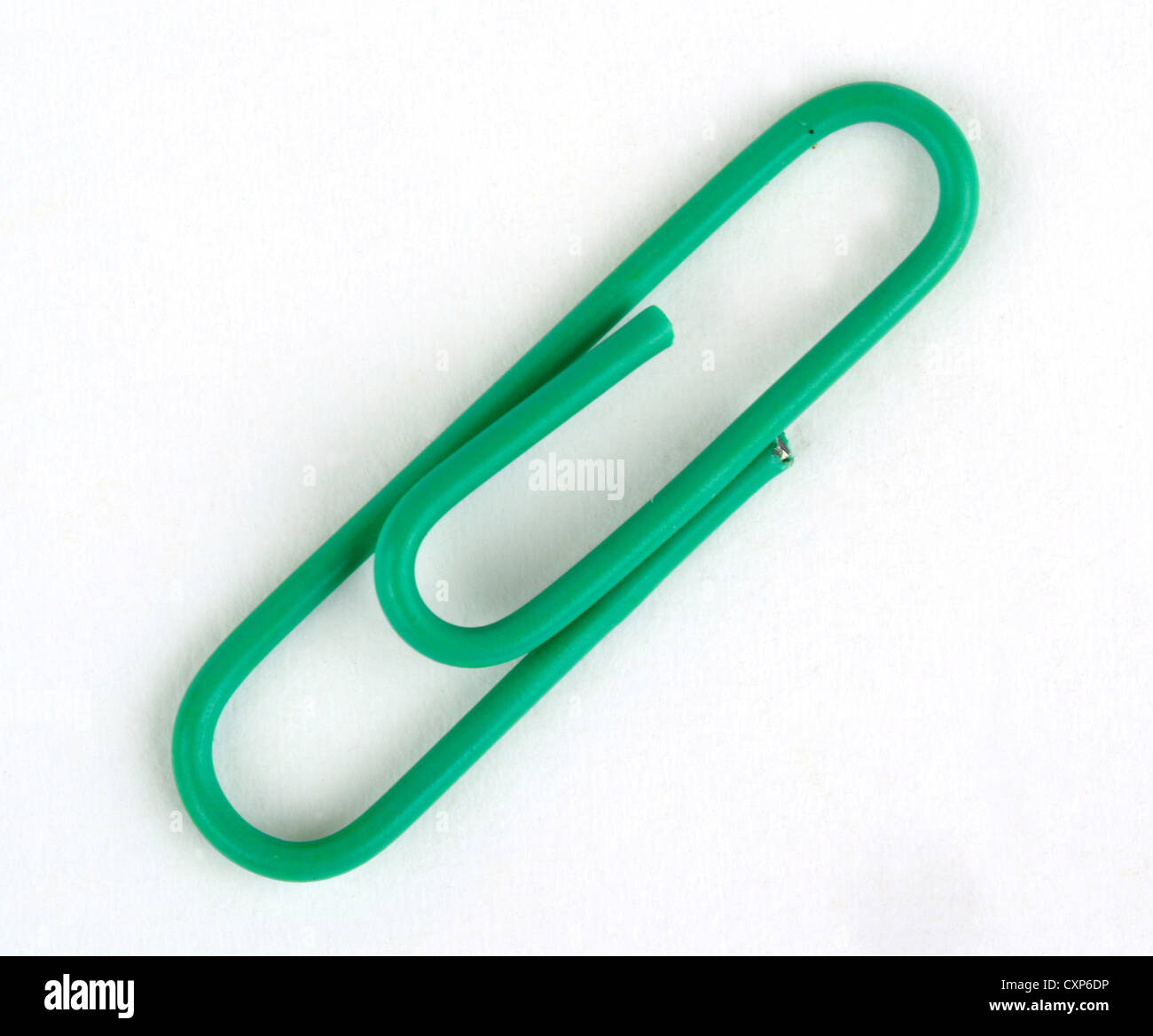 Green paper clip. Stock Photo