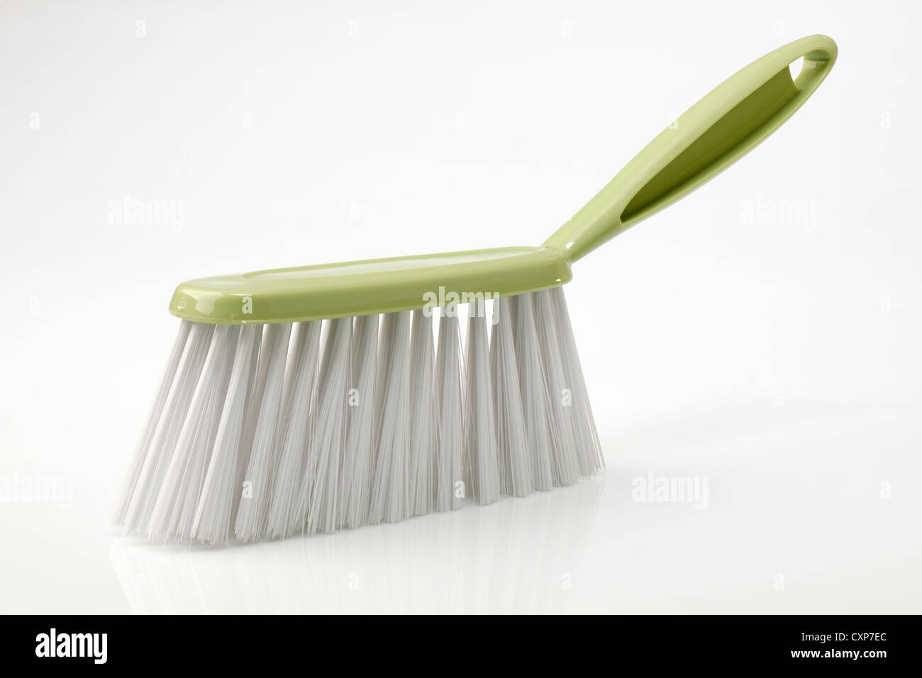 Small green nylon bristles hand brush Stock Photo Alamy