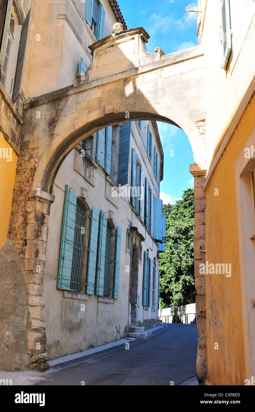 A beautiful arched street in Arles  one of  many among narrow streets and  medieval in character,near the Amphitheatre.Arles Stock Photo