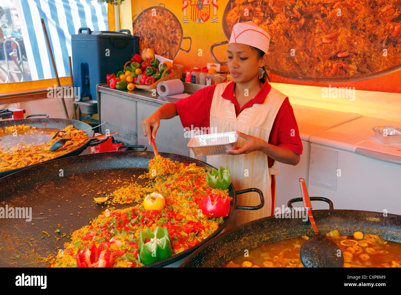 Spanish foods such as paellas and asopaos served from Spanish street kitchen or stall on Stroeget (Strøget), Copenhagen, Denmark Stock Photo
