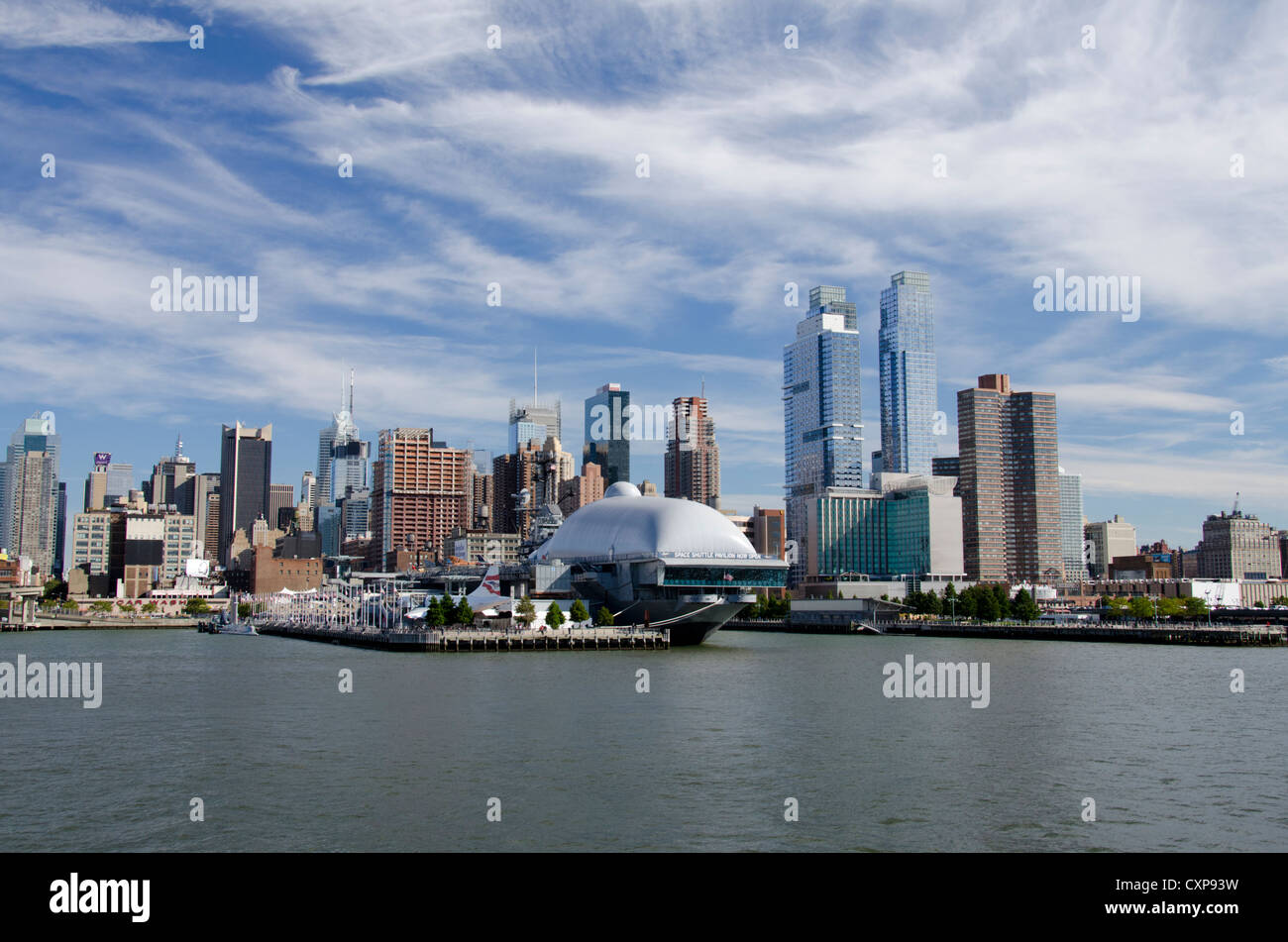 New York, New York. Downtown city skyline at Manhattan Terminal cruise ship pier. Space Shuttle Pavilion. Stock Photo
