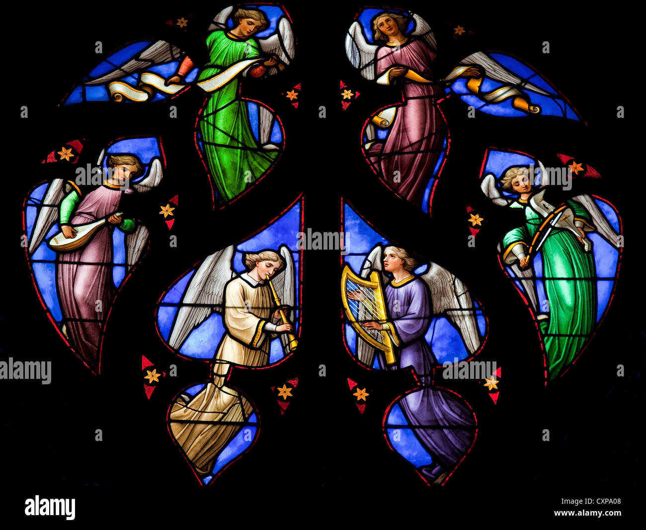 Stained glass window depicting an Angels choir, in the cathedral of Brussels Stock Photo