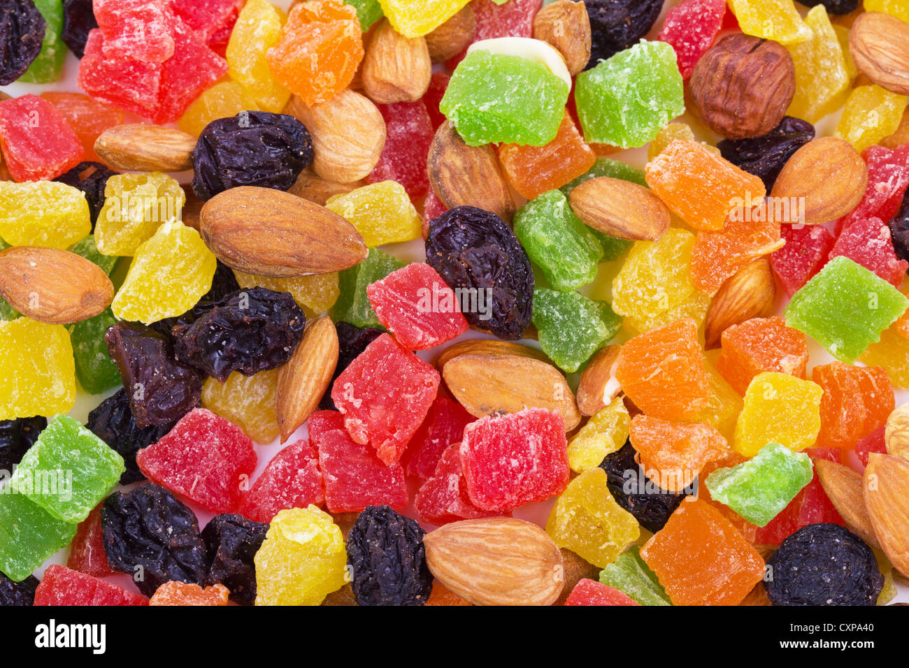 Nuts and raisins mixed with fruit candy multicolored all sorts