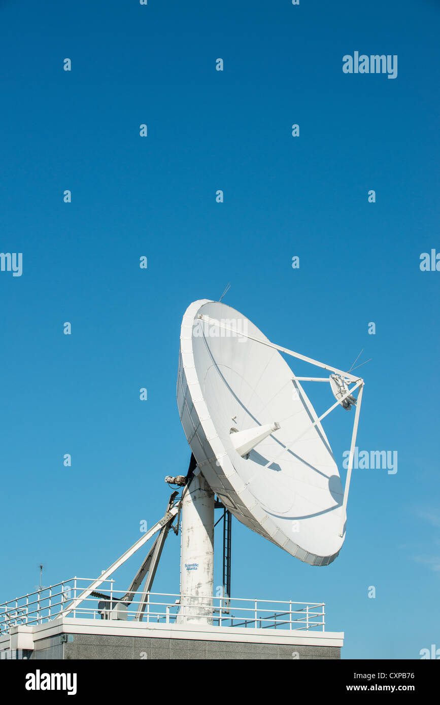 Satellite dish for broadcasting communication signals Stock Photo