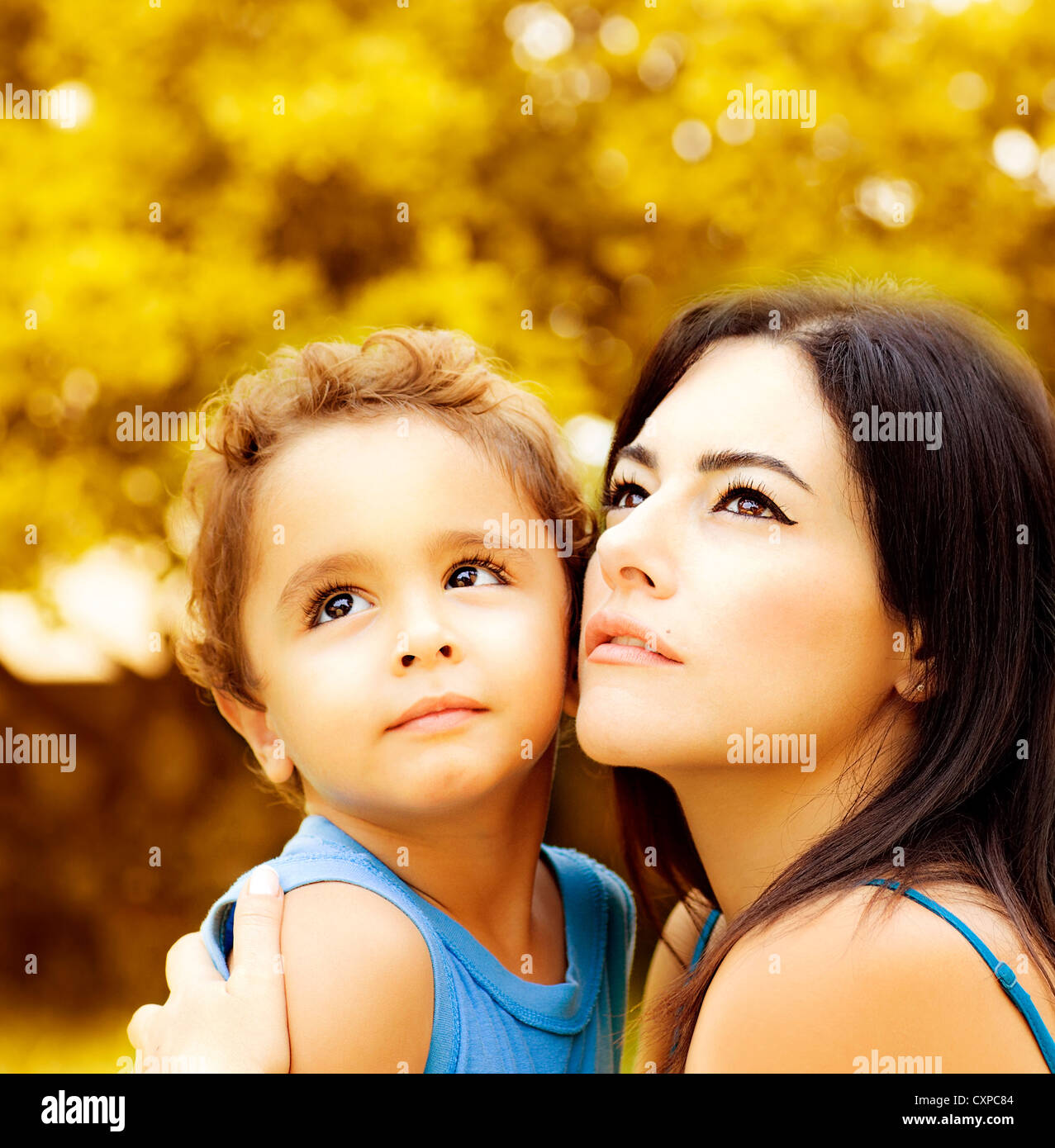 Image Of Cute Baby Boy Hug His Lovely Mom In Autumn Park Closeup