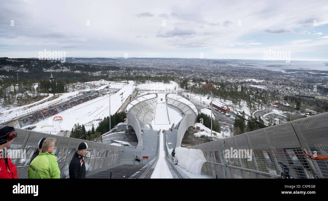 Holmenkollen Ski Jump, Holmenkollen, Norway. Architect: JDS Architects, 2011. View from top of ski jump with jumpers. Stock Photo