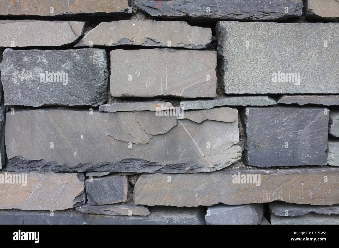 Slate brickwork on a wall in the English Lake District Stock Photo
