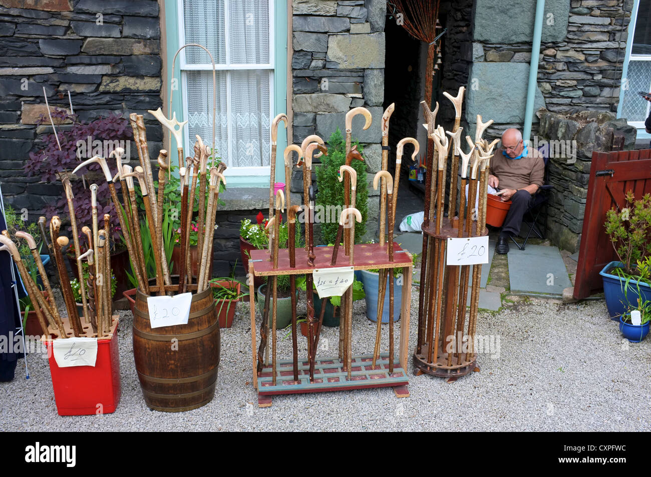 The Lake District homemade walking sticks on sale Stock Photo Alamy