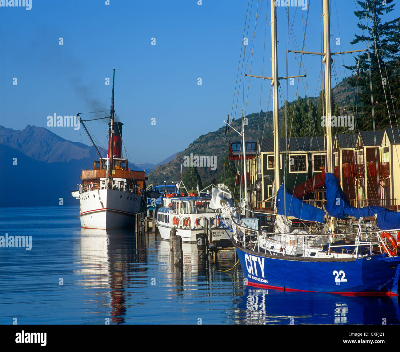 Waterfront with boats Earl Queenstown New Zealand Stock Photo
