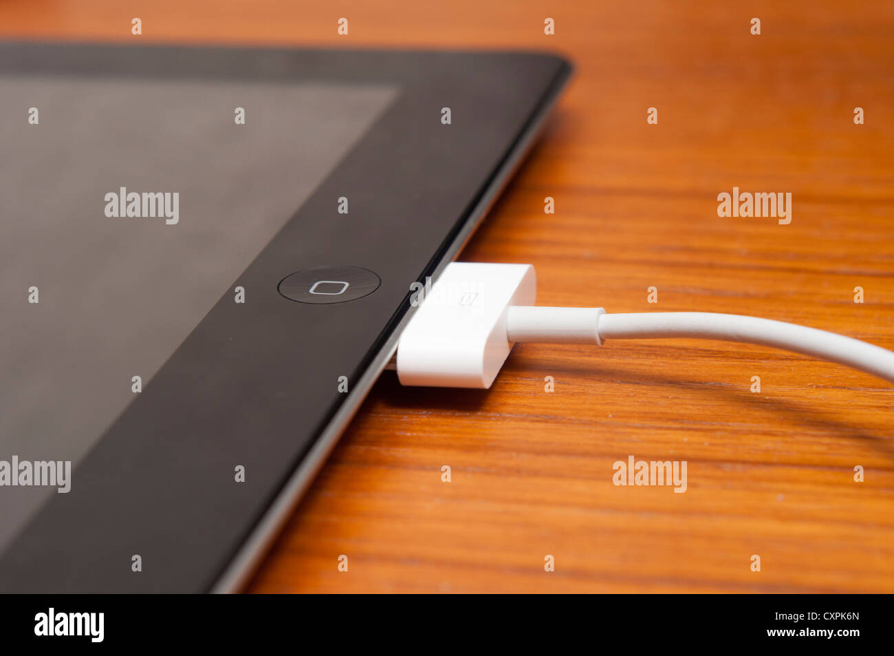 Ipad charging hi-res stock photography and images - Alamy