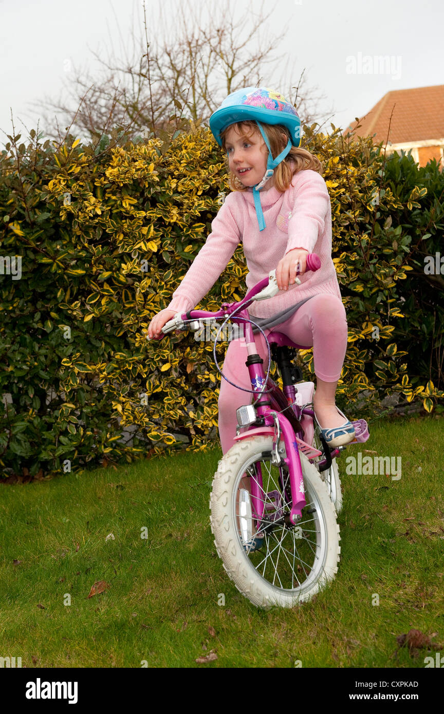 Child riding a bicycle Stock Photo Alamy